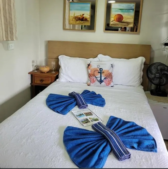 Chalé 2 anchor-themed bedroom